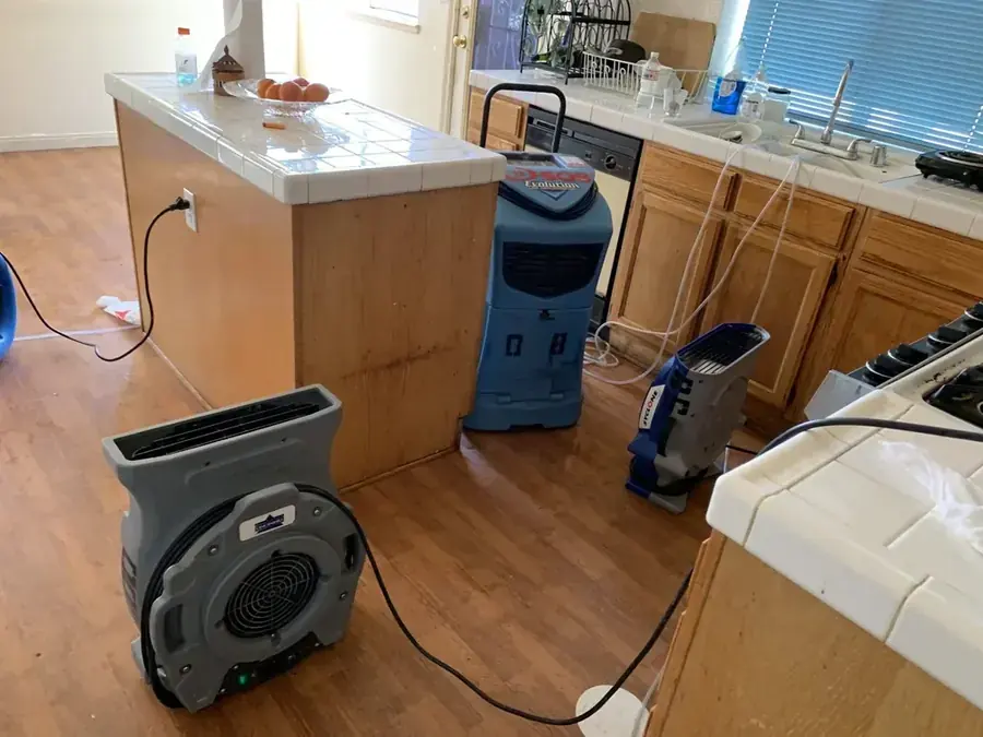 A wall opened to dry the cavity in a Peoria, AZ home