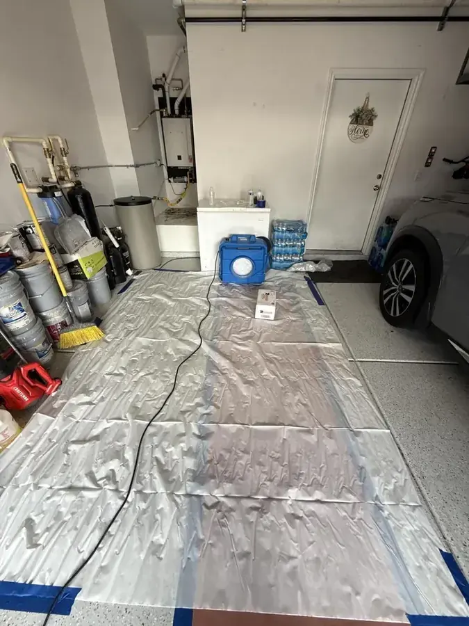 AC condensate overflow dried below the air handler in a Peoria, AZ home
